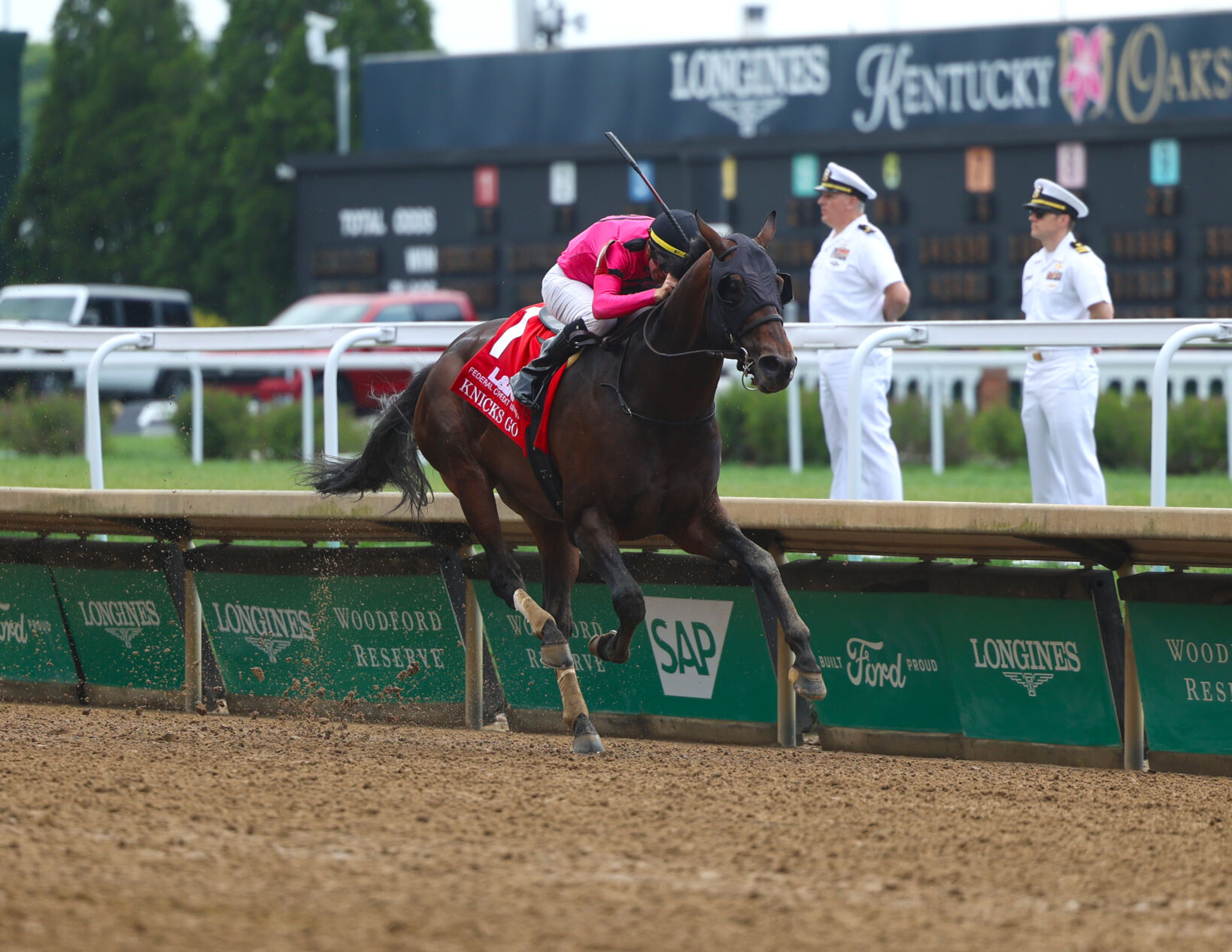 Horse closes near finish line at Churchill.JPG